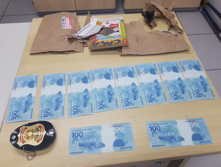 Cédulas falsas de real apreendidas durante operação da Polícia Federal contra o crime de moeda falsa no sul de Minas